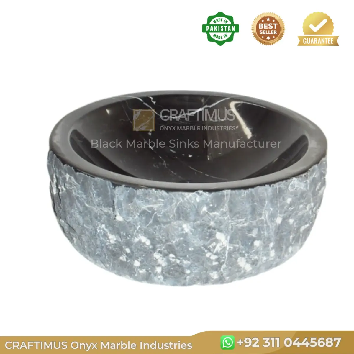 Black onyx sink with a textured gray marble exterior, featuring a smooth, glossy finish.