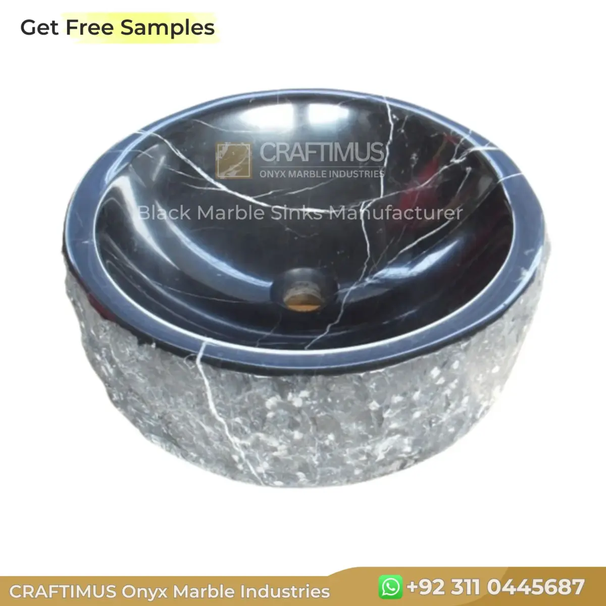 Black marble sink with polished surface and unique veining, perfect for luxury bathroom designs.