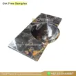 Black marble sink with golden veining, stylish design for modern bathrooms.