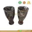 Black marble vases with gold veining, elegantly designed for home decor.