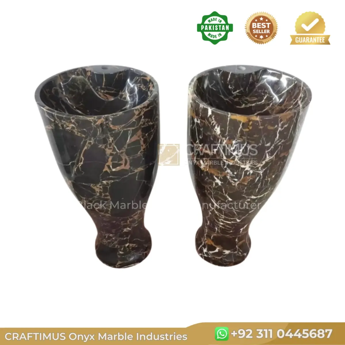 Black marble vases with gold veining, elegantly designed for home decor.