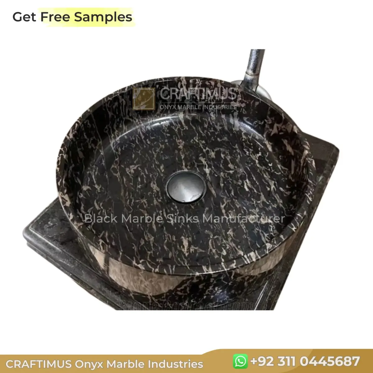 Black marble round sink with unique veining, perfect for luxurious bathroom designs.