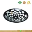 Black and white marble sink with a checkered pattern, perfect for modern bathrooms.